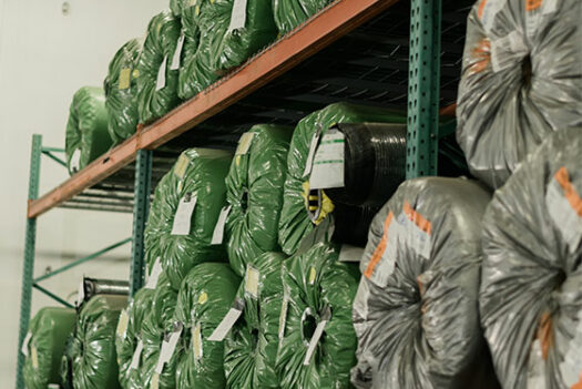 Synthetic turf on pallet racks