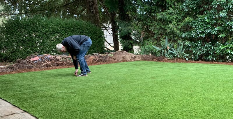 https://www.syntheticturfnorthwest.com/wp-content/uploads/2022/07/remove-weeds-artificial-grass.jpg