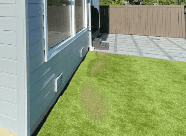 Synthetic Turf Northwest - Example of severe window reflection damage