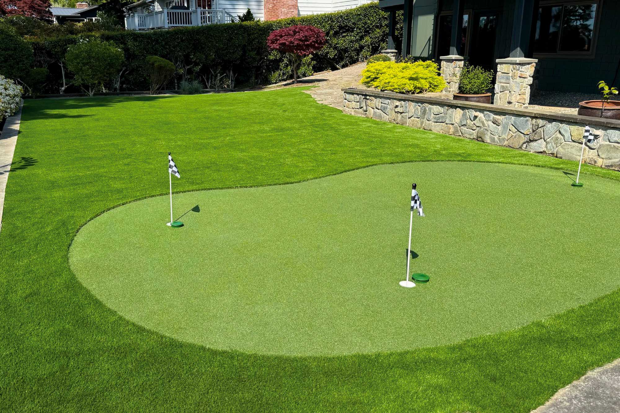 Artificial putting green in backyard